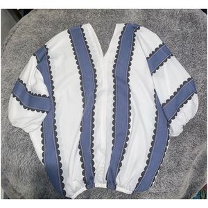 Loose blouse with v cuts